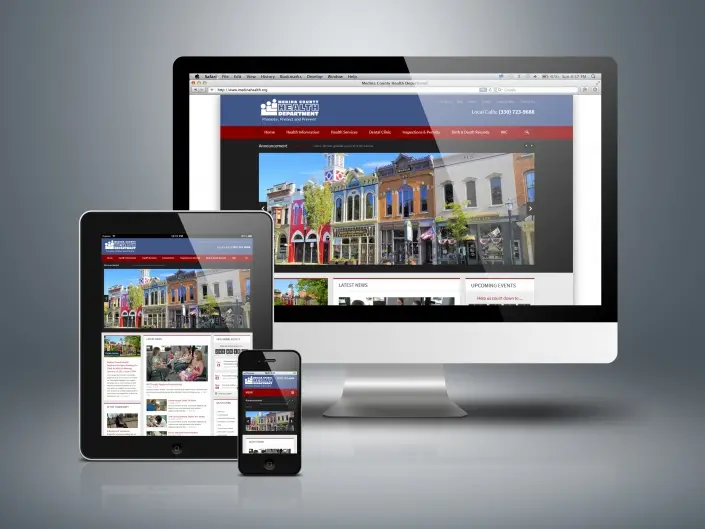 Website design by Matthew McWilliam shown on a desktop monitor, laptop, tablet and phone — design 6 of 17
